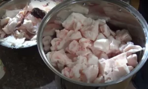 So much pork fat in a bowl. What happens if you eat pork fat?