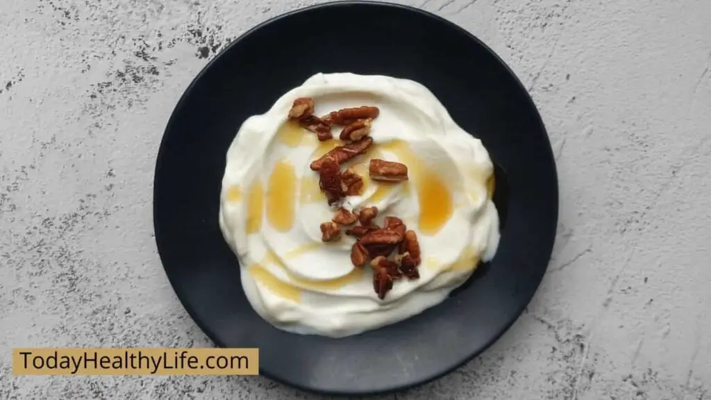 A plate of yogurt with pecan nuts, how long can yogurt sit out?