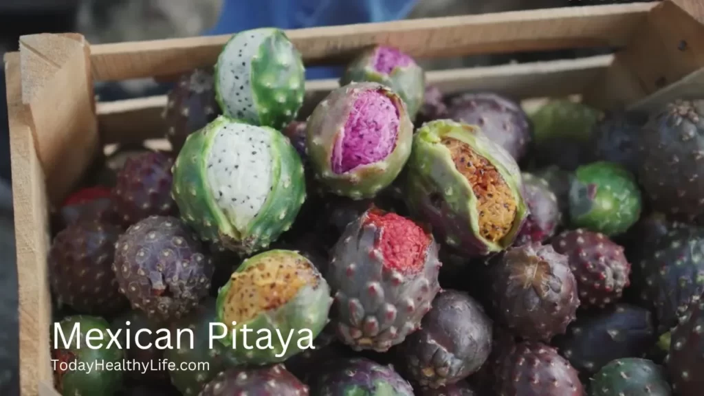 A wooden basket is full of Mexican pitaya.